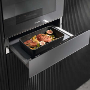 Wärmeschublade von Miele mit Braten darin – Elektrogeräte in Marl